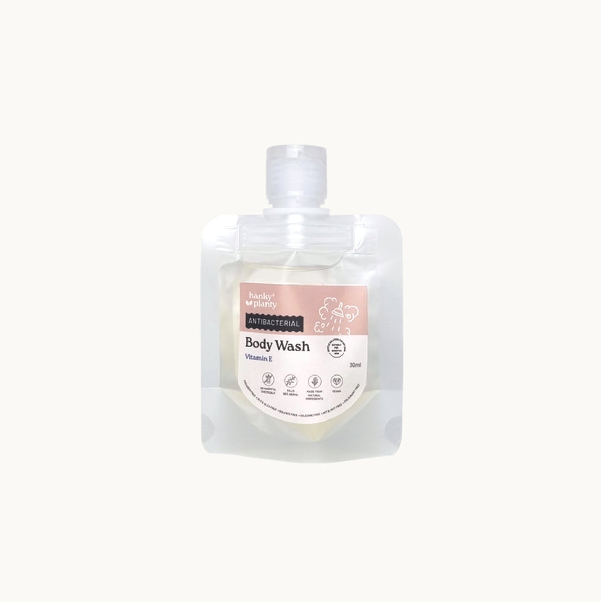 Hanky Planty Petite Antibacterial Body Wash, Vitamin E, 30ml refill pouch with pink label, displayed on a white background.