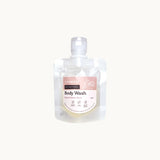 Hanky Planty Petite Antibacterial Body Wash, Rose & White Musk scent, 30ml refill pouch with pink label, displayed on a white background.

